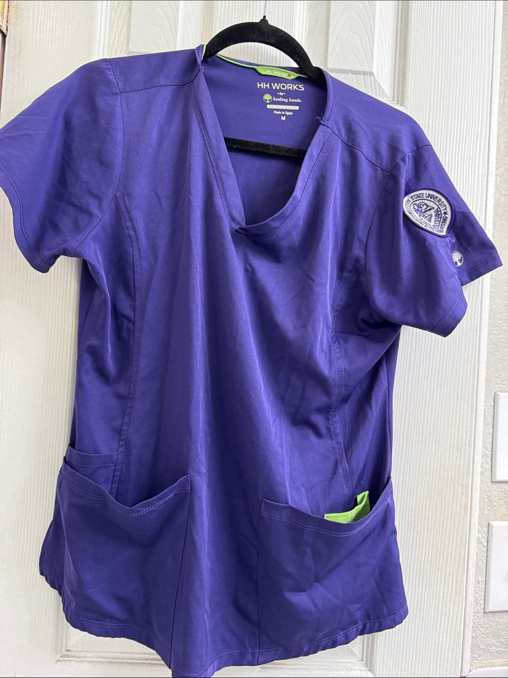 HH Works Purple Medical Scrub Top with Northwestern State patch sewn in